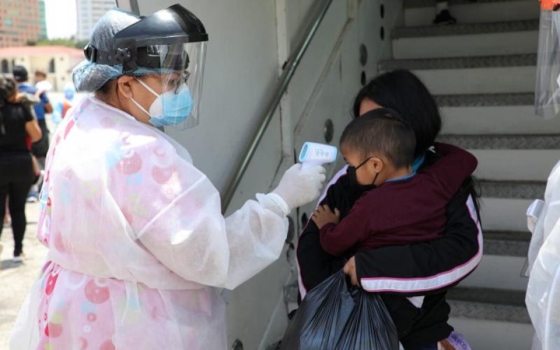 Migrantes retornados a su ingreso a Guatemala.